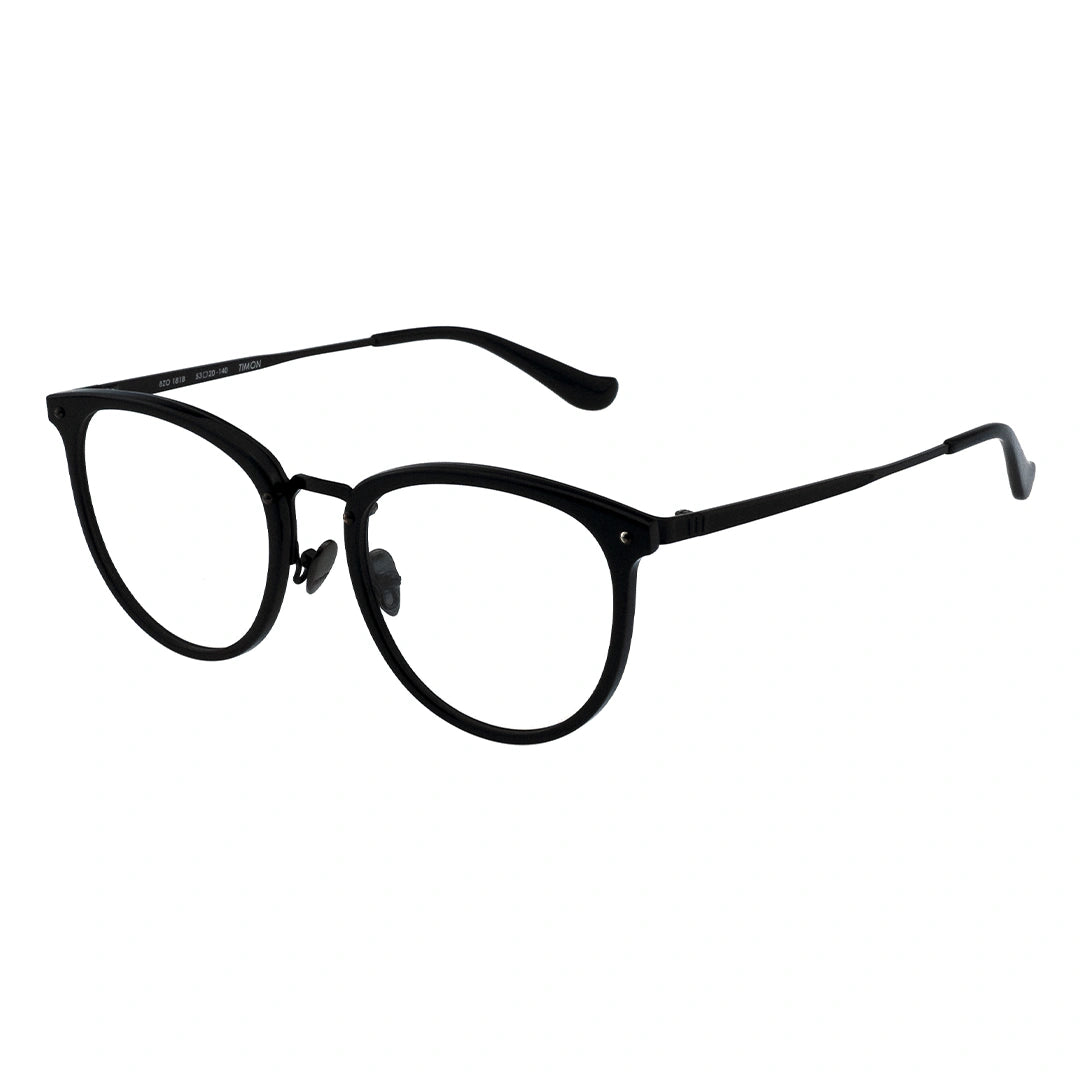 A pair of oval eyeglasses with a black frame and transparent lenses, featuring a metallic browline.