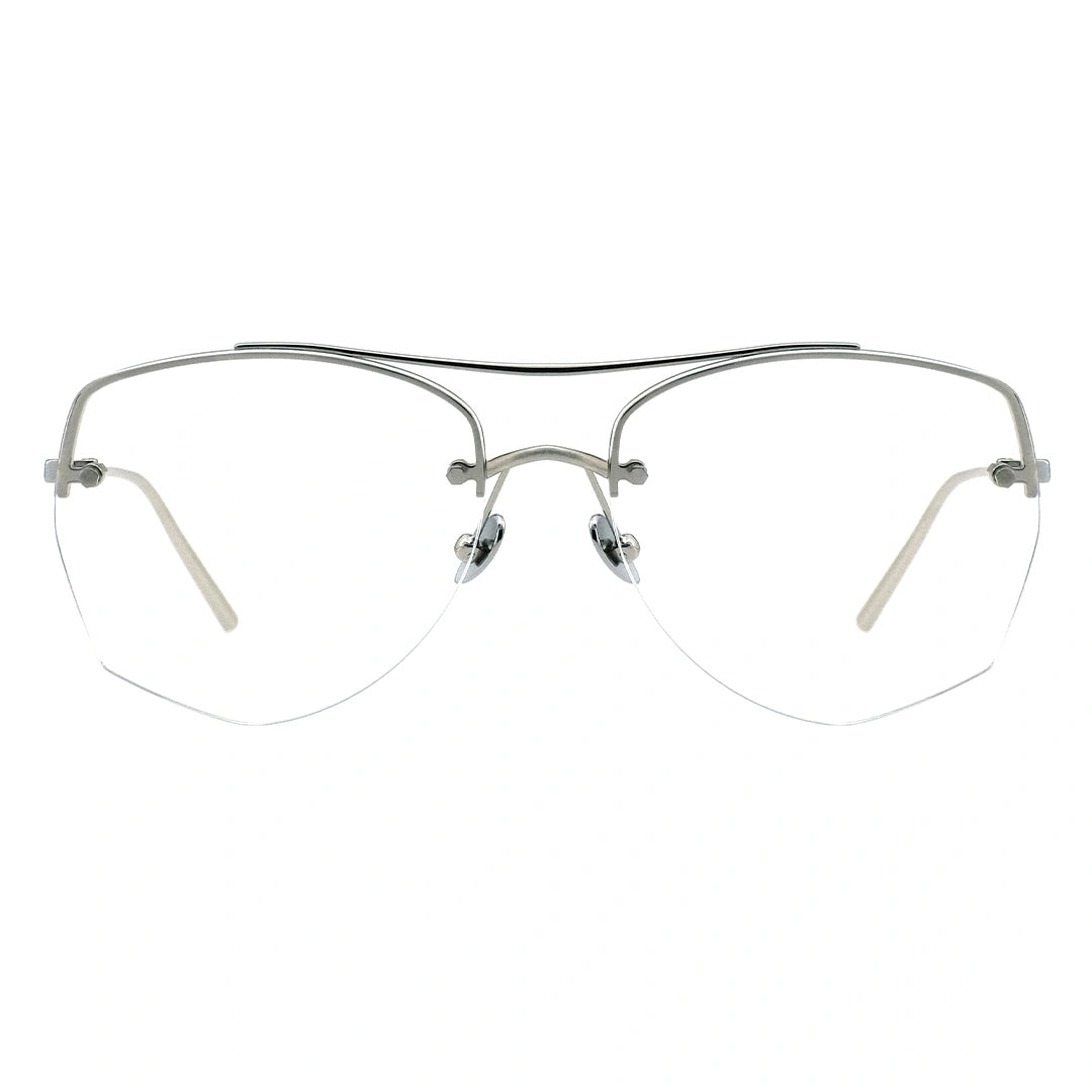 A pair of browline eyeglasses with a silver temple and half-rimless
