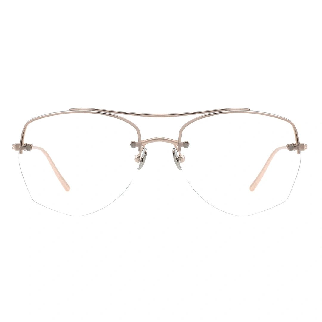 A pair of browline eyeglasses with a rose gold temple and half-rimless