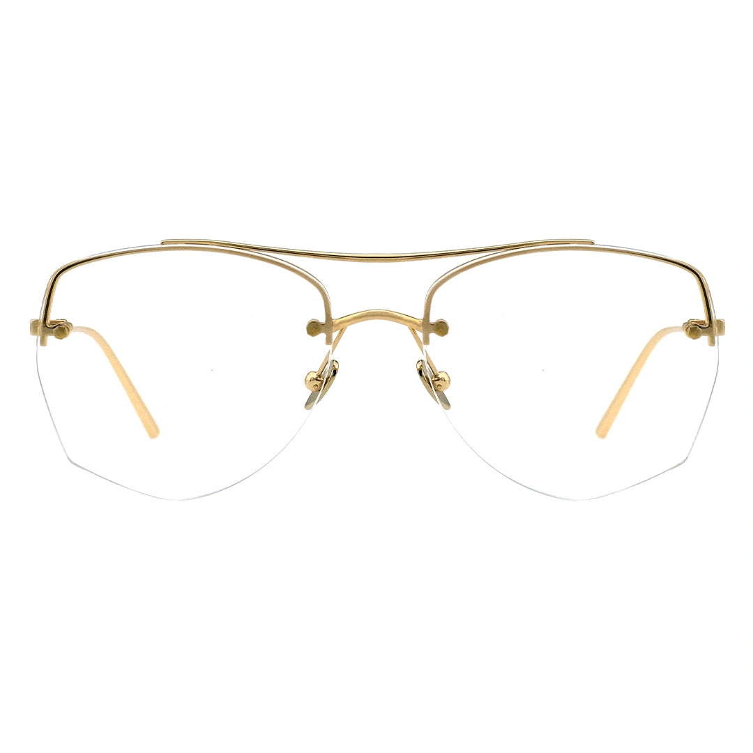 A pair of browline eyeglasses with a gold temple and half-rimless