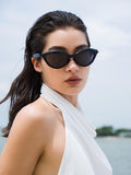 Woman wearing black sunglasses