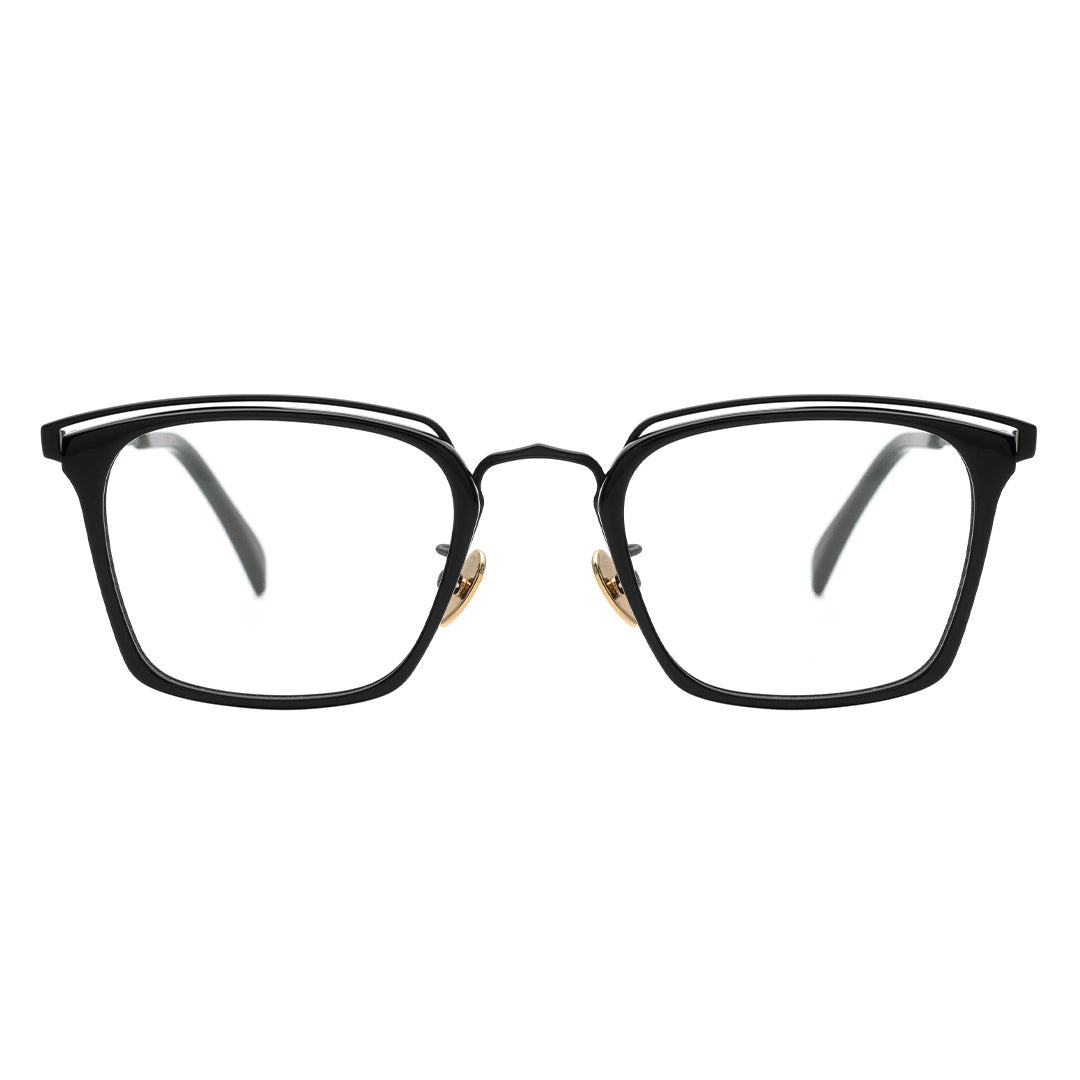 A pair of rectangular eyeglasses with a browline design, featuring a black frame with gold accents on the hinges and transparent lenses.