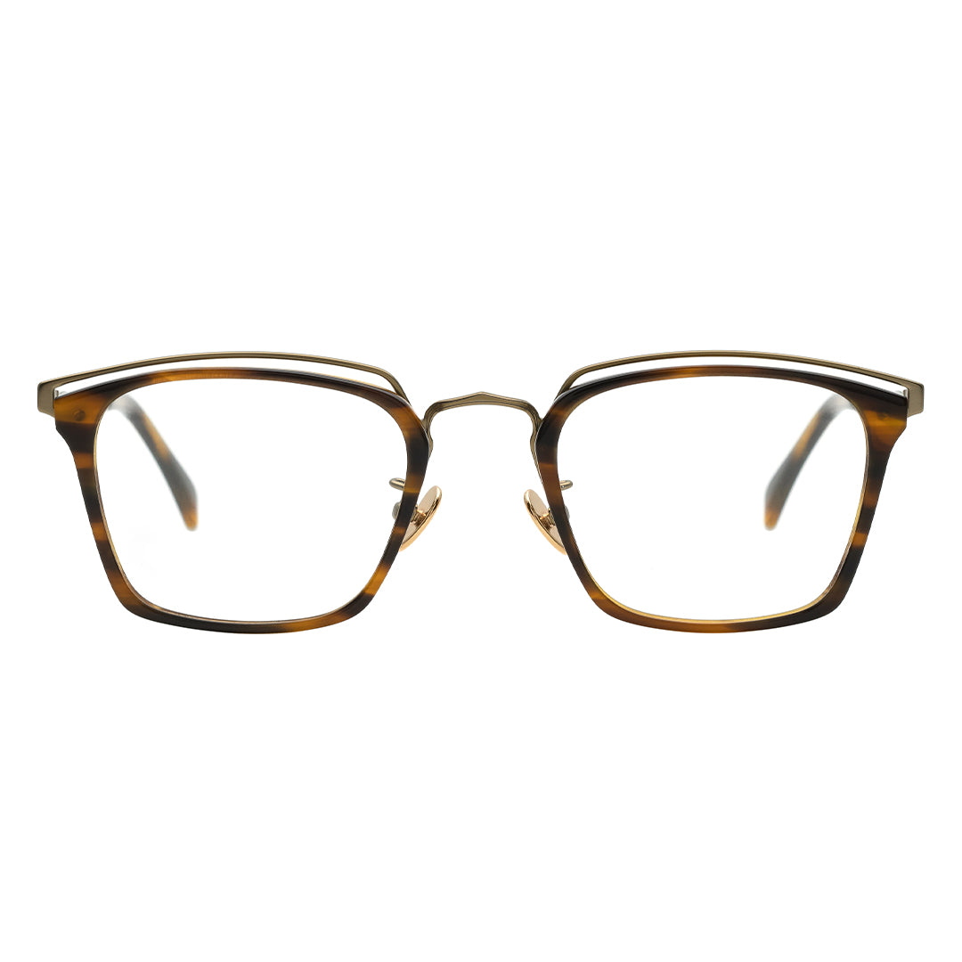 A pair of rectangular eyeglasses with a browline design, featuring a tortoise frame and transparent lenses.
