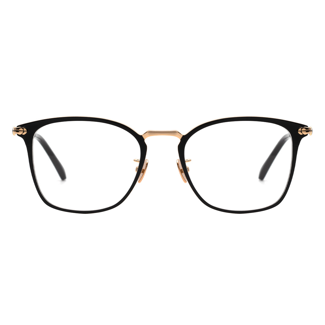 A pair of square eyeglasses with a black frame, gold temples.