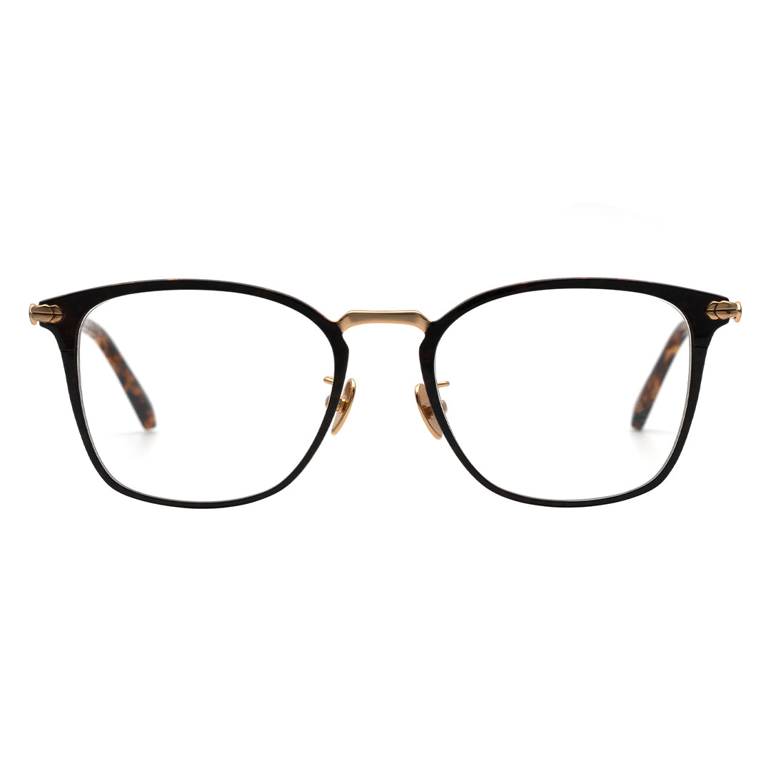 A pair of square eyeglasses with a black frame, gold temples.