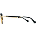 Gold and black eyeglasses on a white background