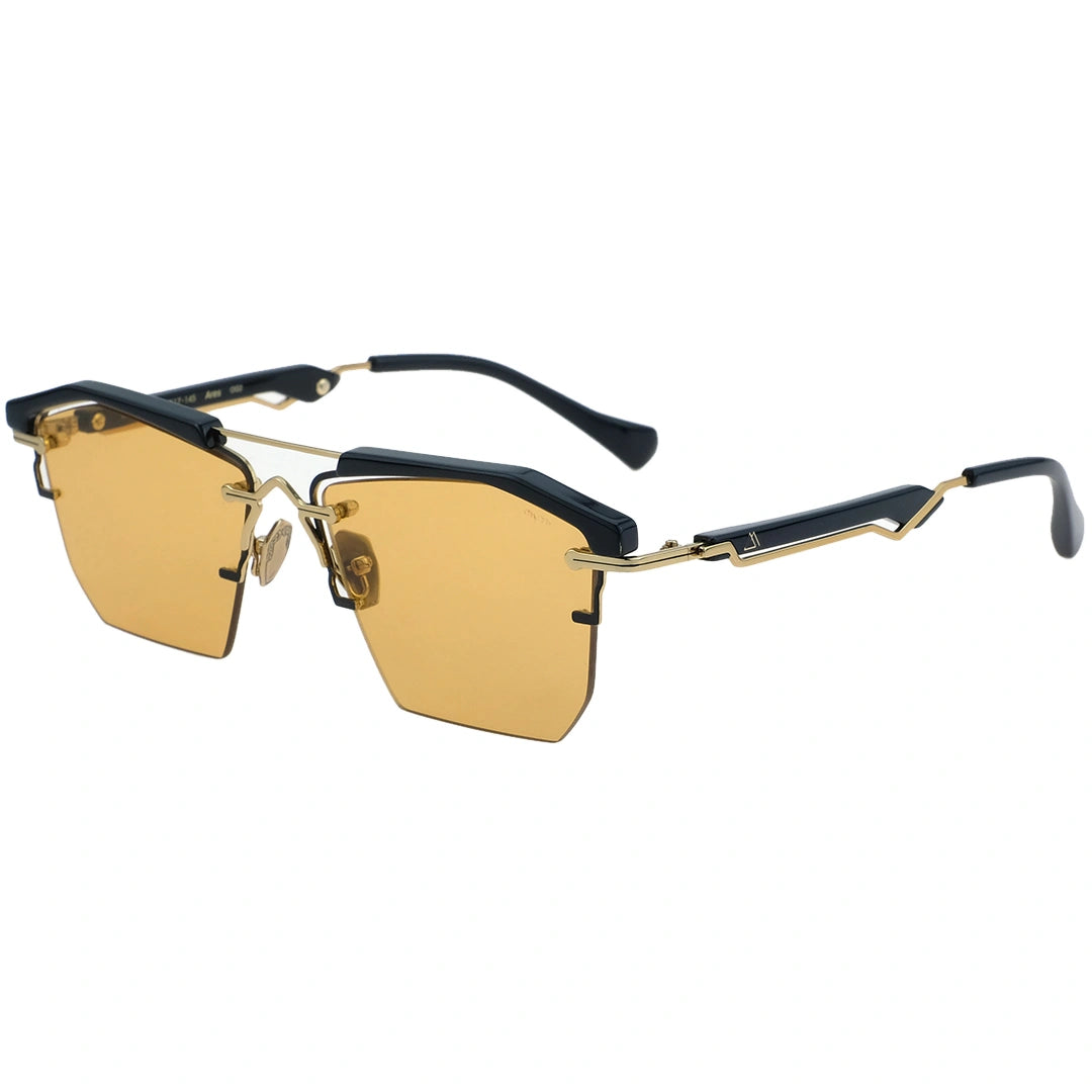 Gold sunglasses with black frames on a white background