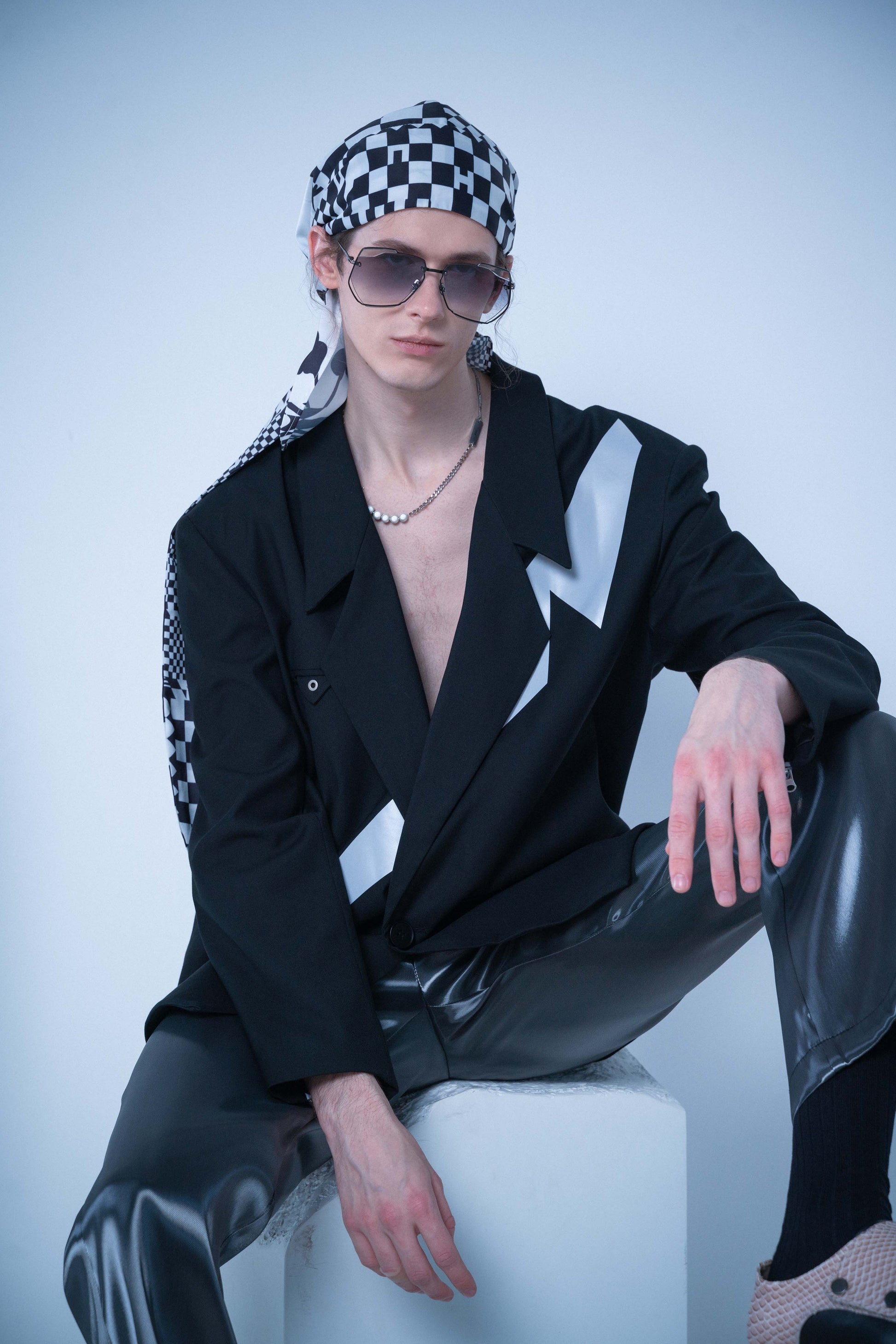 model in MYTH GREECE ESCHER geometric sunglasses grey thin silver metal frame aviators vintage retro elegant sunglasses