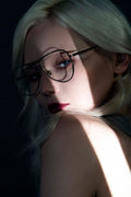 A model wears AIKTON eyeglasses