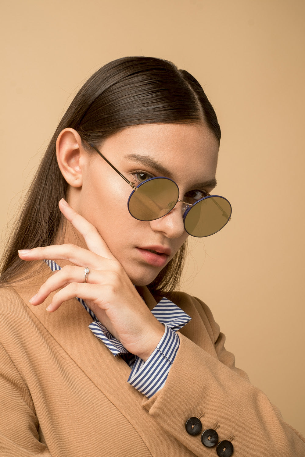 lady in MYTH Greece  CIR ZERO retro round sunglasses gold mirrored, thin metal frame sunglasses with adjustable nose pad, sunglasses in 70s for mens and womens