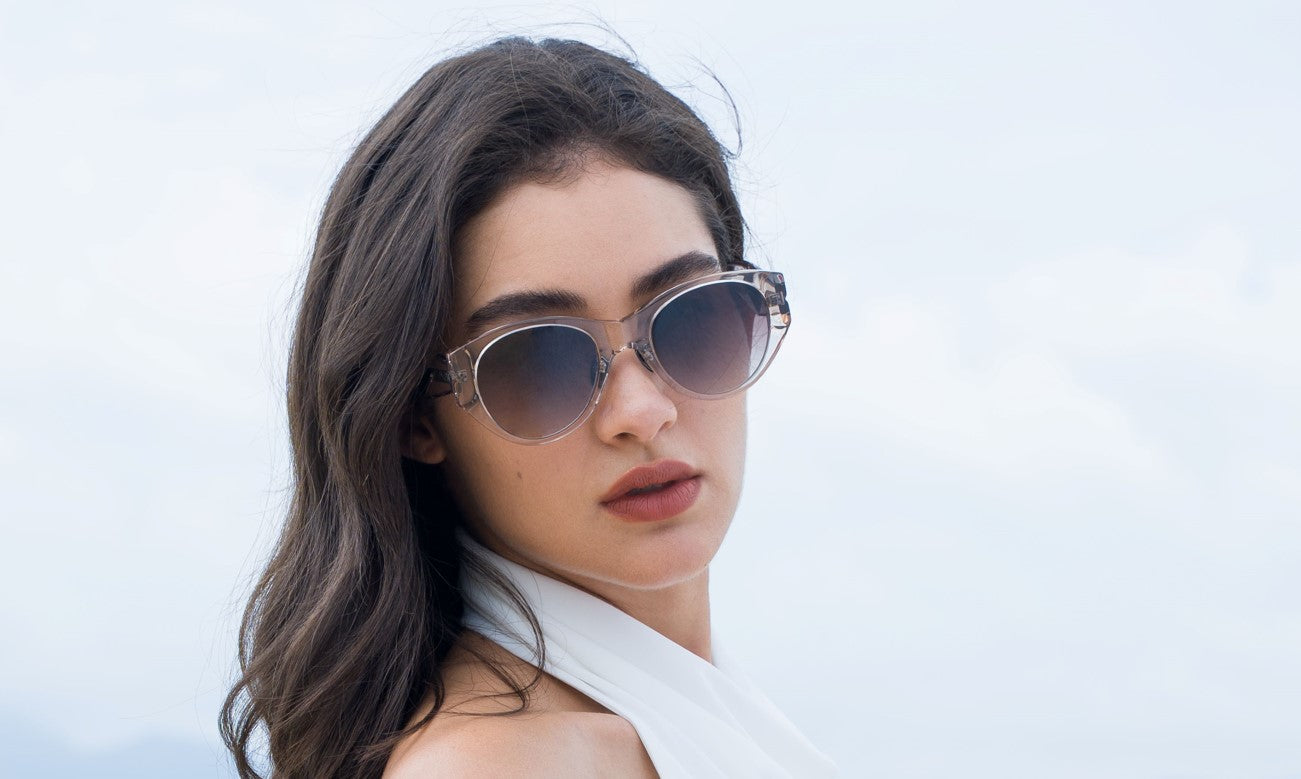 woman wearing translucent sunglasses