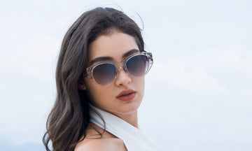 woman wearing translucent sunglasses