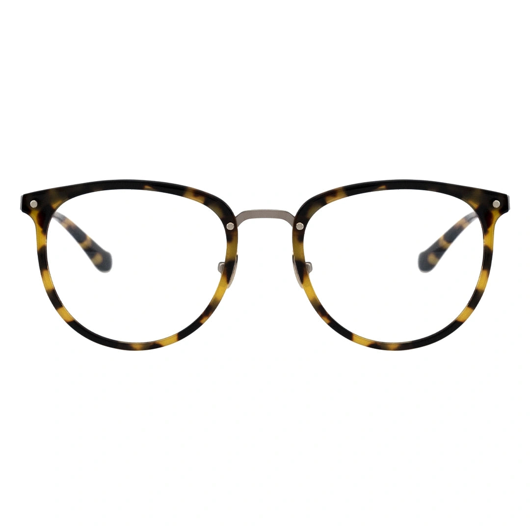 A pair of oval eyeglasses with a tortoise patterned frame and transparent lenses, featuring a metallic browline.
