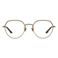 Gold-rimmed eyeglasses on a white background