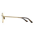 Gold-framed sunglasses with tortoiseshell arms on a white background