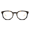 Tortoiseshell eyeglasses with gold accents on a white background
