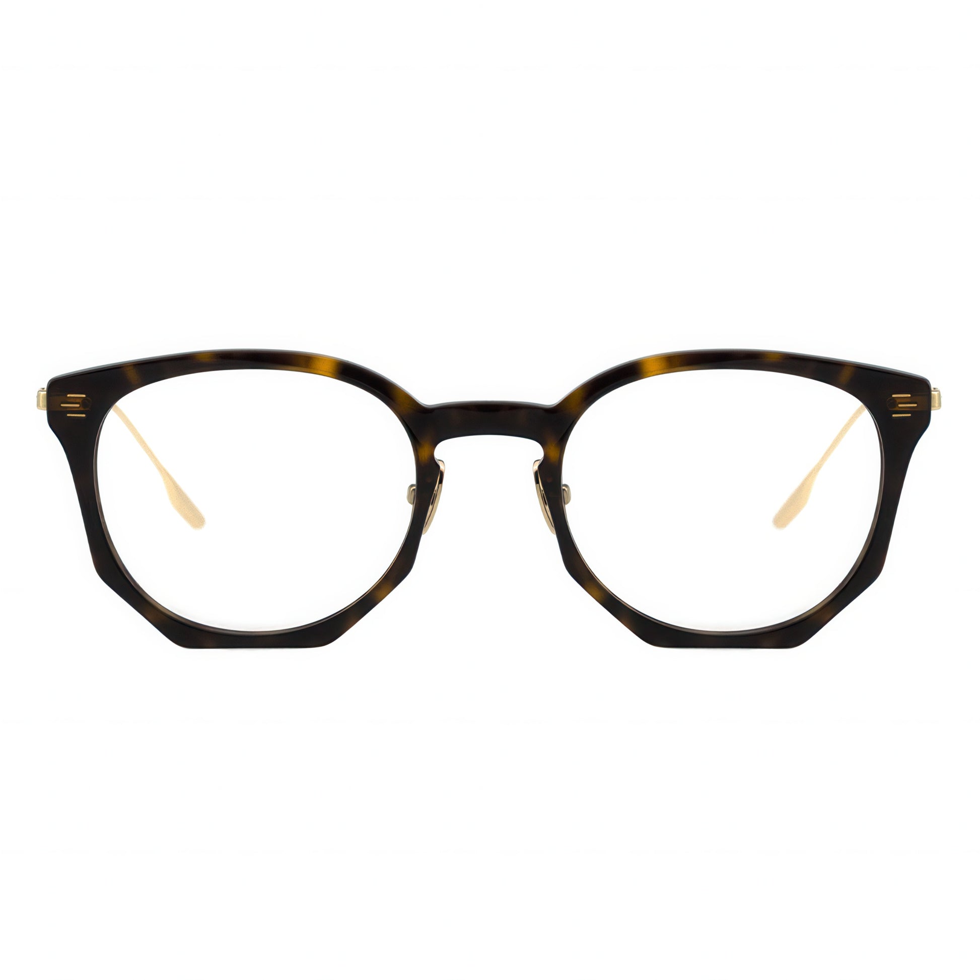 Tortoiseshell eyeglasses with gold accents on a white background