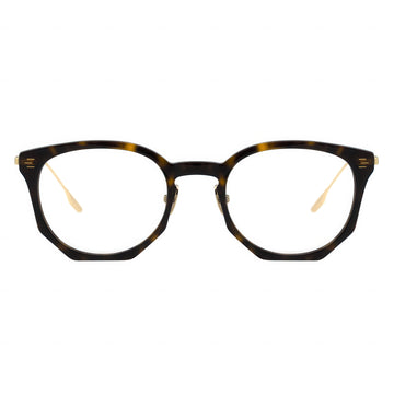 Tortoiseshell eyeglasses with gold accents on a white background