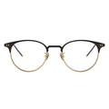 Black and gold eyeglasses on a white background