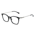 Black eyeglasses with silver accents on a white background