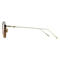 Sunglasses with tortoiseshell frame and gold arms