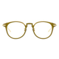 Gold-rimmed eyeglasses 