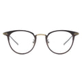 brown eyeglasses with gold accent
