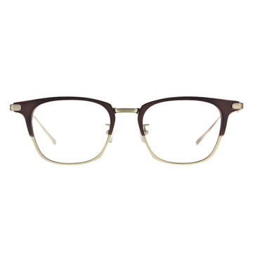A pair of eyeglasses with a clubmaster style. The frame features dark brown/burgundy plastic on the top, with gold/light brown metal rimming the bottom of the lenses and connecting the bridge and nose pads. The temples are a contrasting matte gold/silver metal.