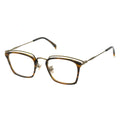 Three-quarter view of angular tortoiseshell glasses with an antique gold layered metal browline.