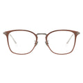 A pair of square eyeglasses with a rustic brown frame, silver temples.