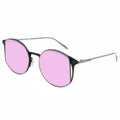 Sunglasses with pink lenses and black frames on a white background