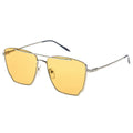 Sunglasses with yellow lenses and thin metal frame on a white background