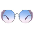 Round sunglasses with pink and blue gradient lenses on a white background