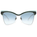 Butterfly sunglasses with blue lenses on a white background