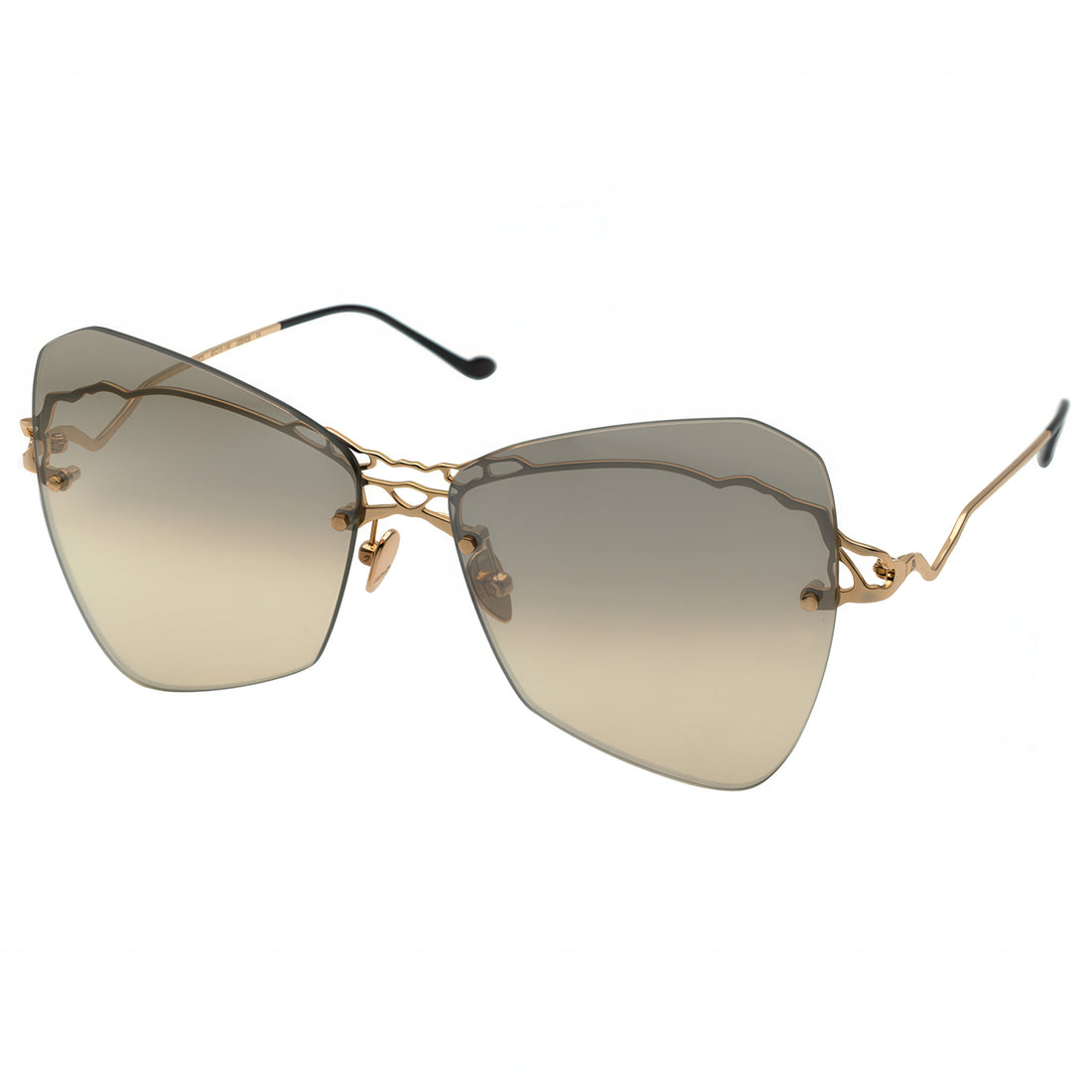 Sunglasses with gold frame and gradient lenses on a white background