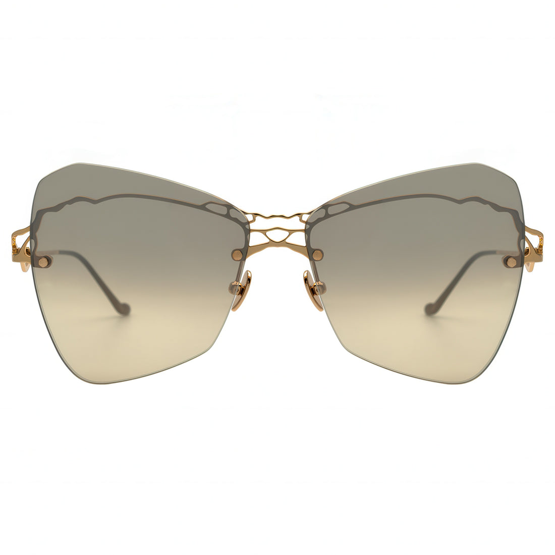 Sunglasses with gold frame and gradient lenses on a white background