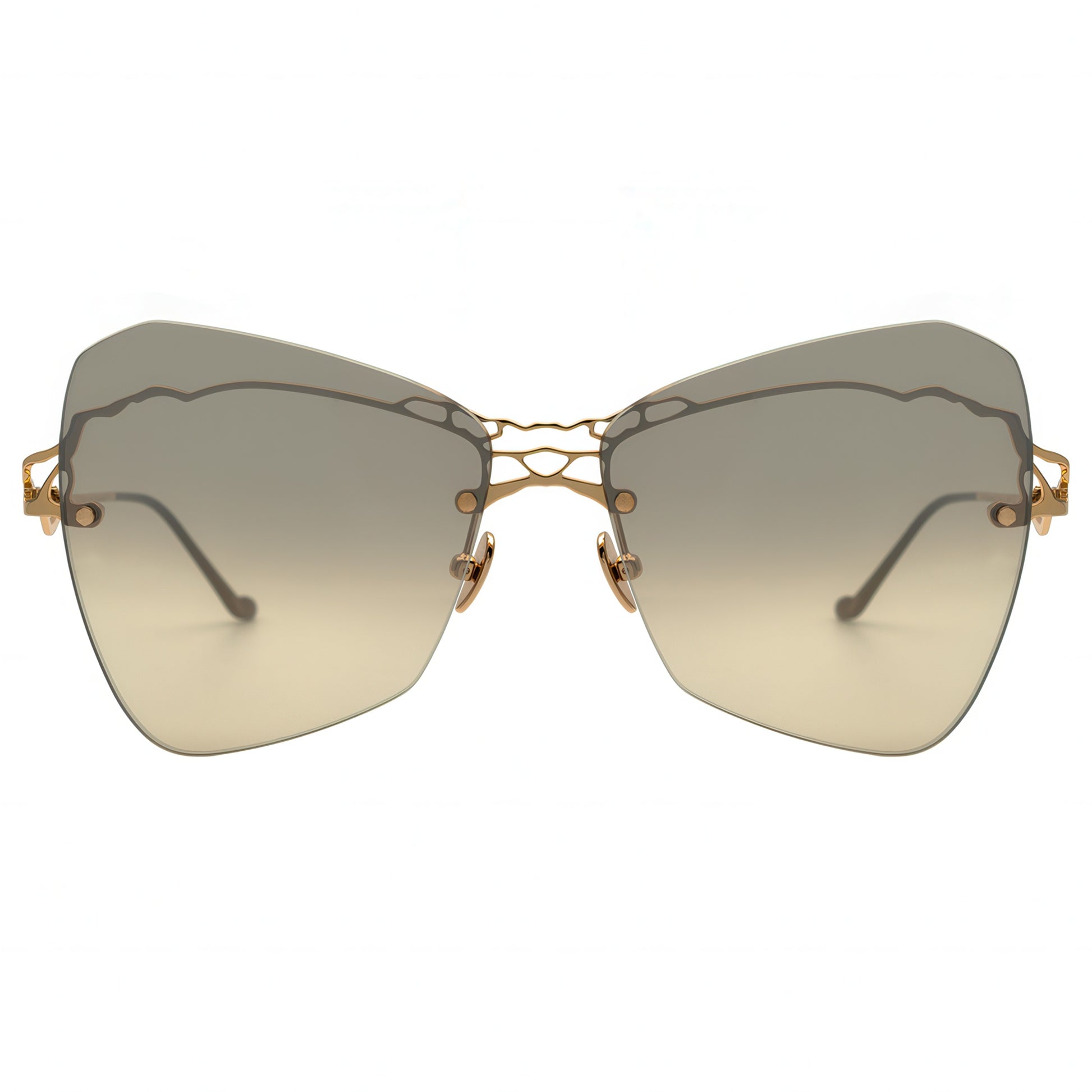 Sunglasses with gold frame and gradient lenses on a white background