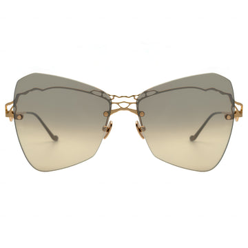 Sunglasses with gold frame and gradient lenses on a white background