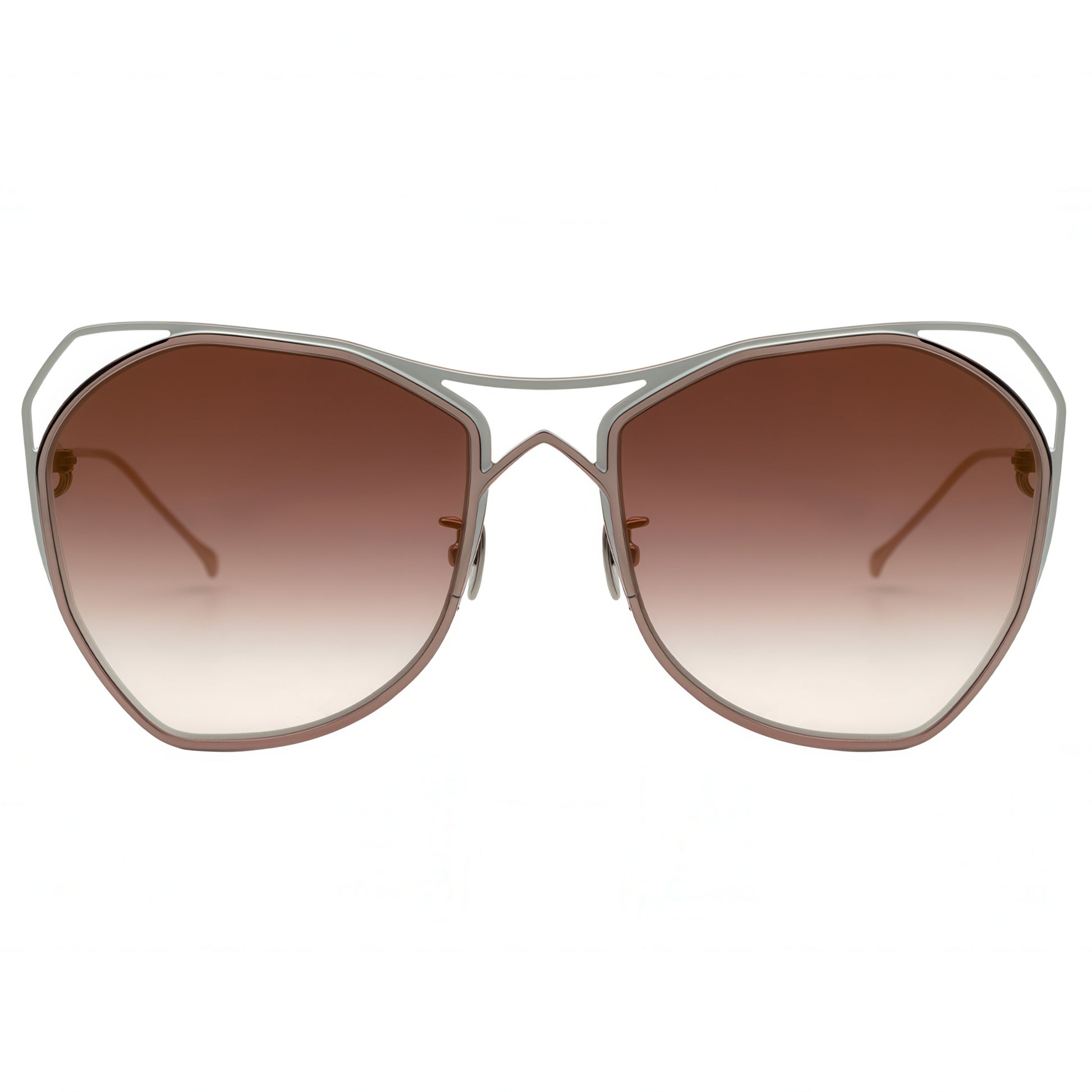 Sunglasses with gradient lenses and metallic frame on a white background