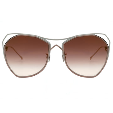 Sunglasses with gradient lenses and metallic frame on a white background