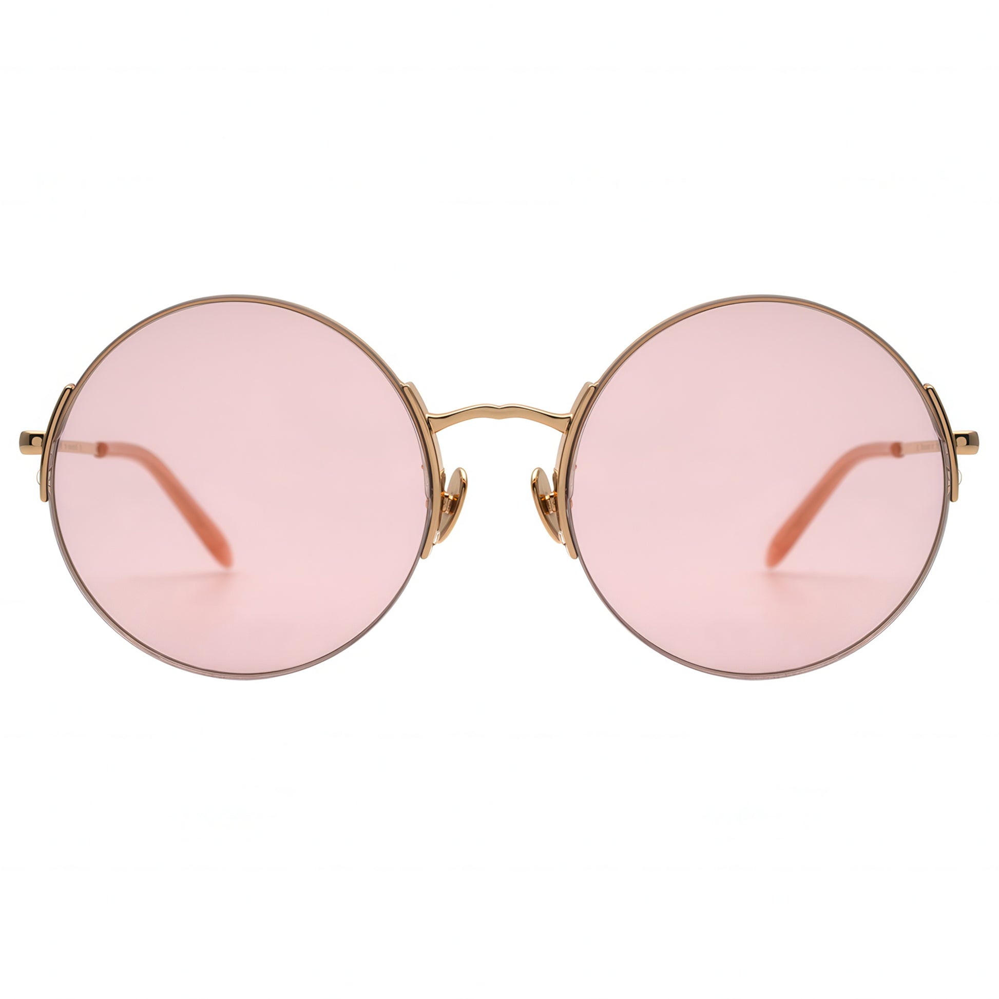 Round sunglasses with pink lenses and gold frames on a white background