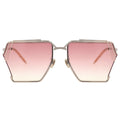 Sunglasses with pink gradient lenses and gold frame on a white background