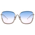 Sunglasses with blue pink gradient lenses and gold frame on a white background