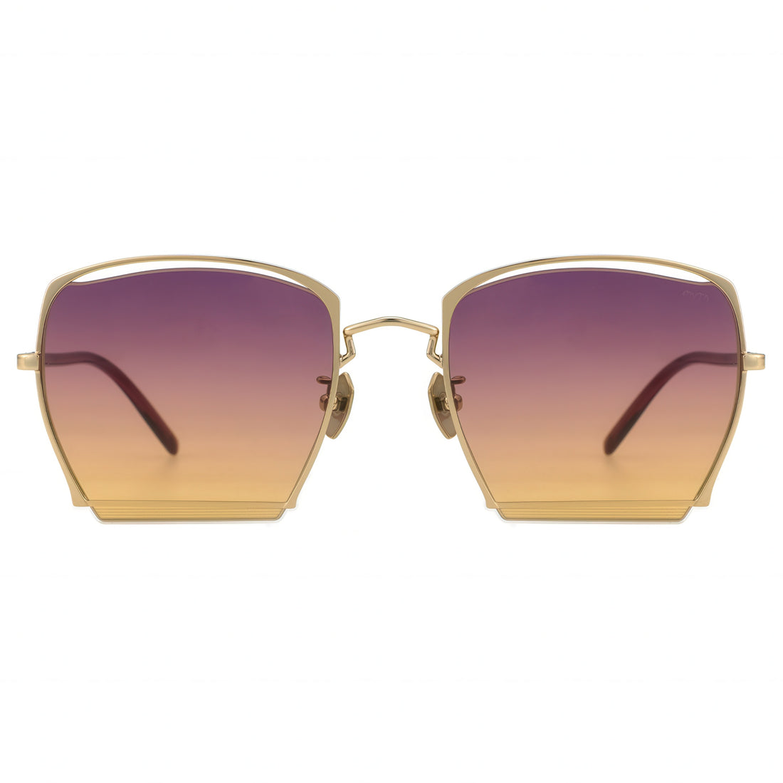 Front view of gold metal-framed OBLIVION sunglasses with oversized geometric lenses in gradient purple to orange, evoking a sunset fade.