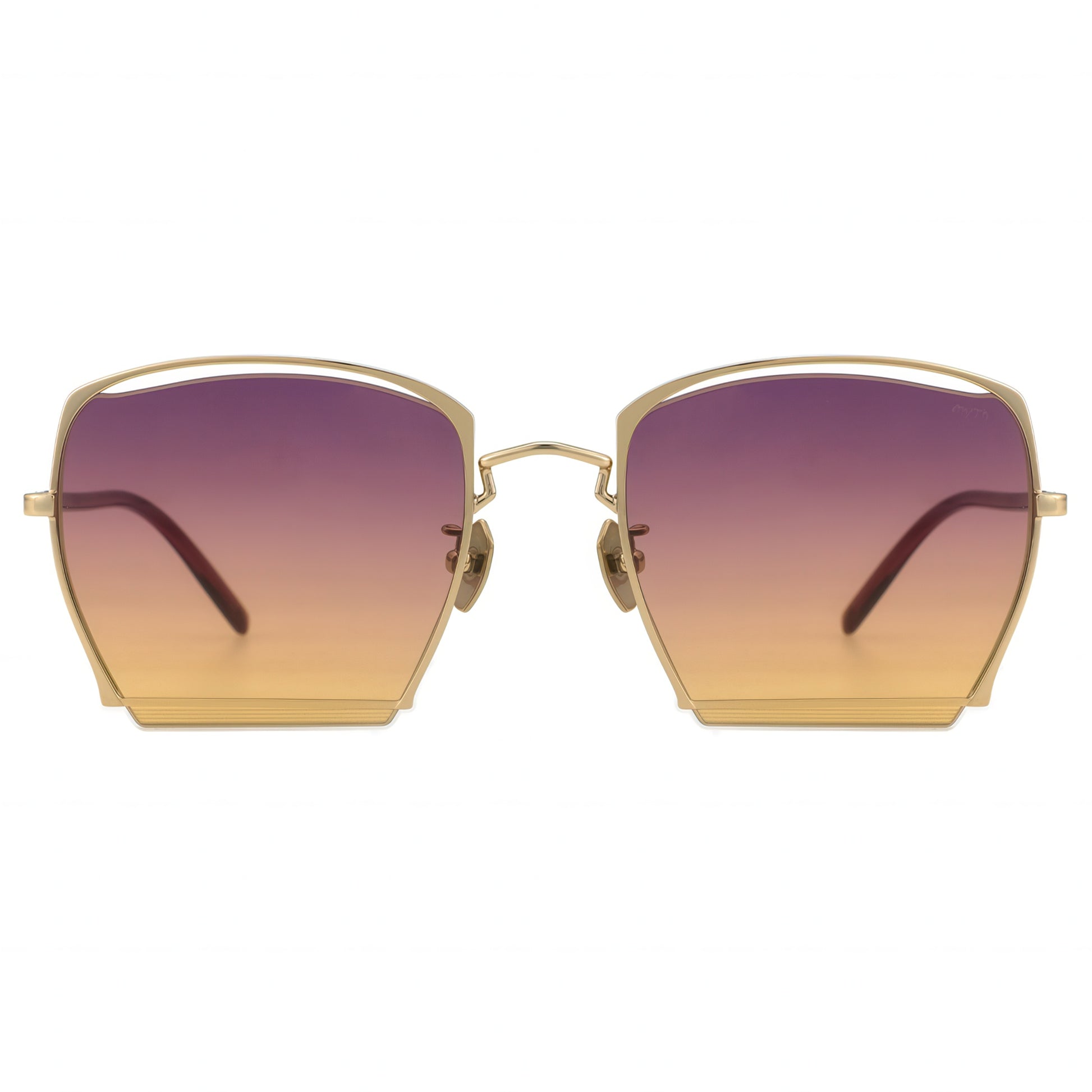 Front view of gold metal-framed OBLIVION sunglasses with oversized geometric lenses in gradient purple to orange, evoking a sunset fade.