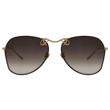 Sunglasses with gold frame and brown gradient lenses on a white background