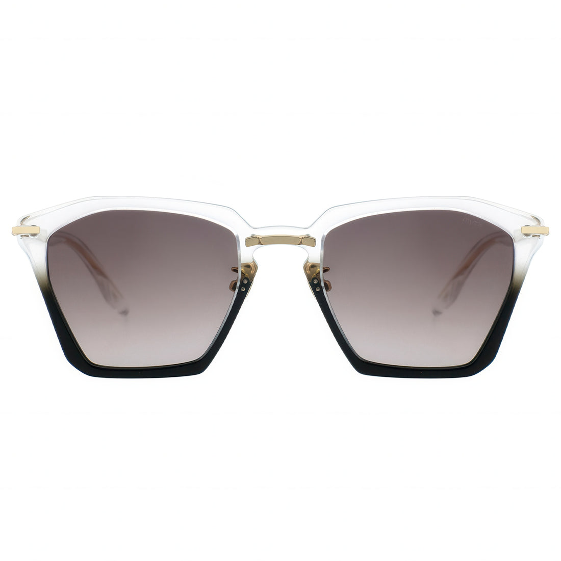 Translucent hexagonal cat-eye sunglasses with gradient brown lenses fading to clear, black bottom edges, and gold-tone metal accents on the temples.