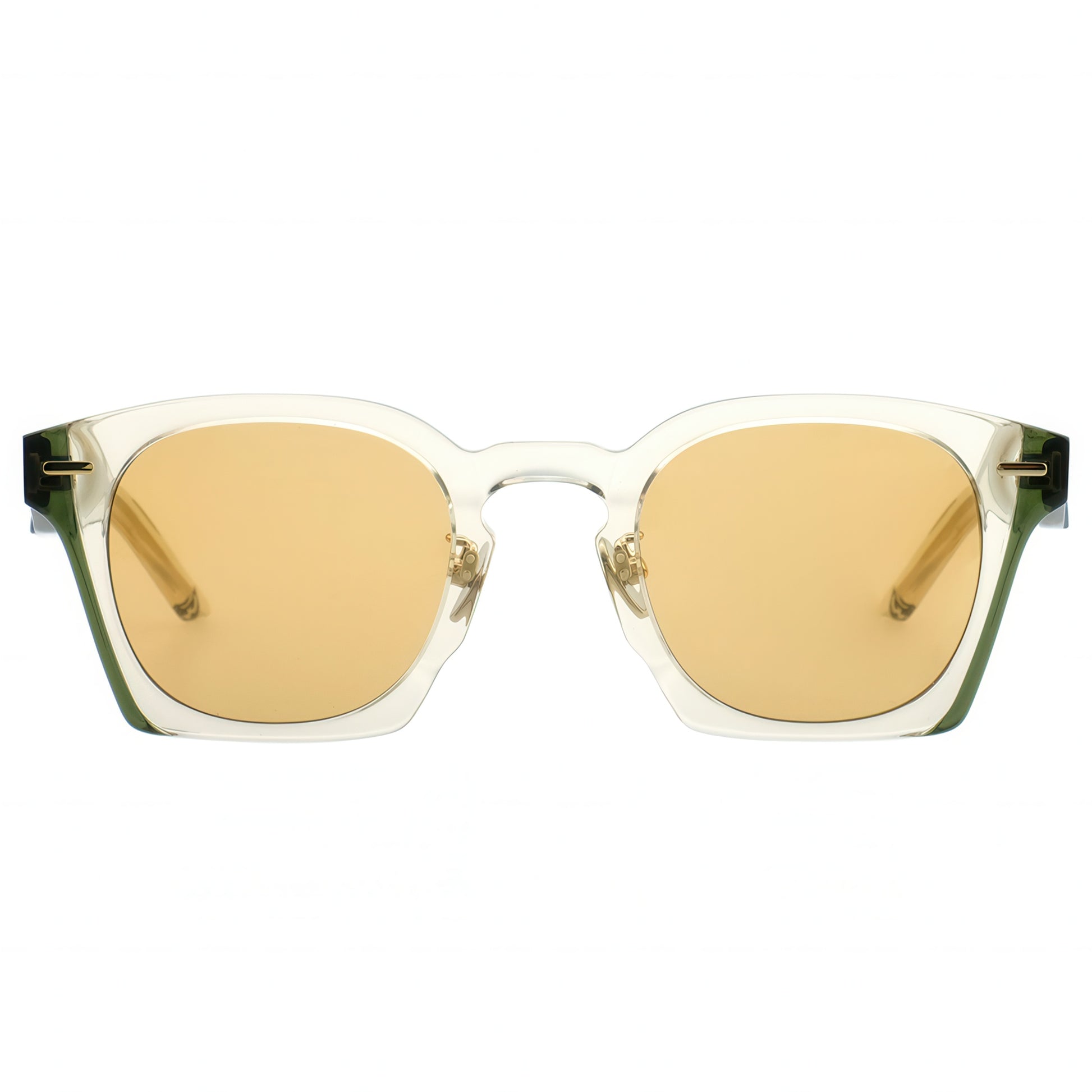 Sunglasses with gold lenses and a clear frame on a white background