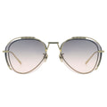 Gold-framed sunglasses with gradient lenses on a white background