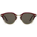 Sunglasses with red and gold frame on a white background